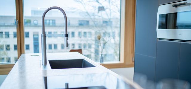 How Far Should Kitchen Faucet Extend into Sink