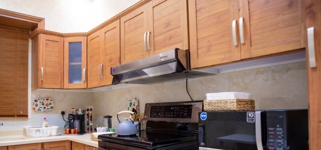 How to Hang Kitchen Cabinets on Plaster Walls